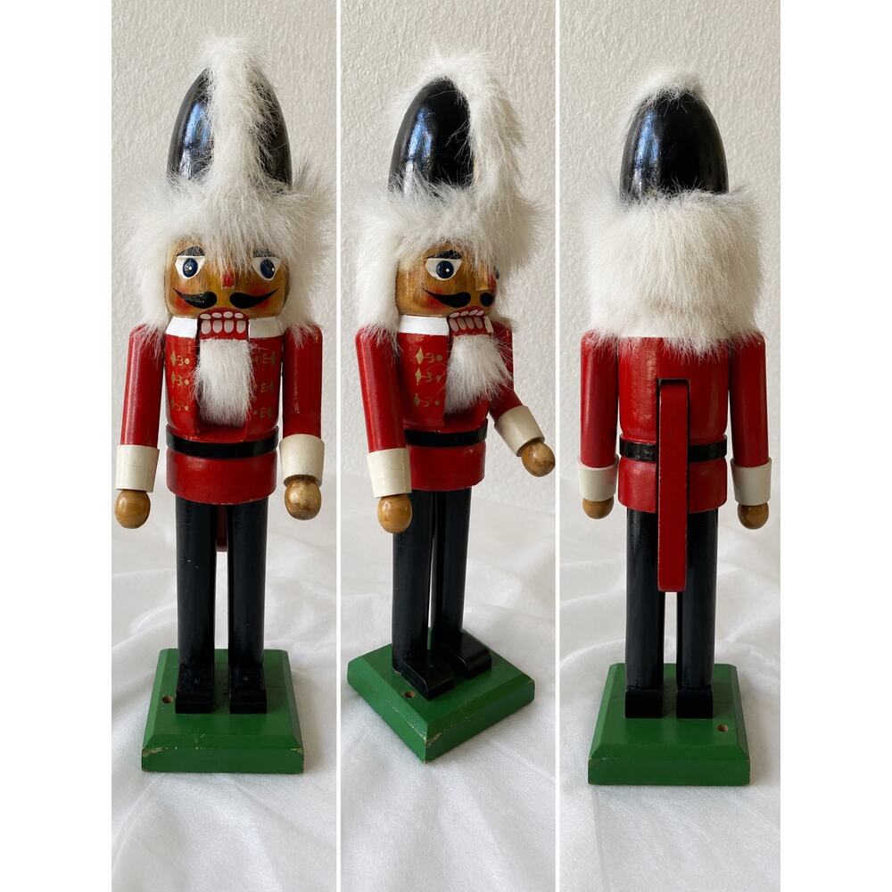 traditional wooden Christmas nutcracker soldier decorated in red and black